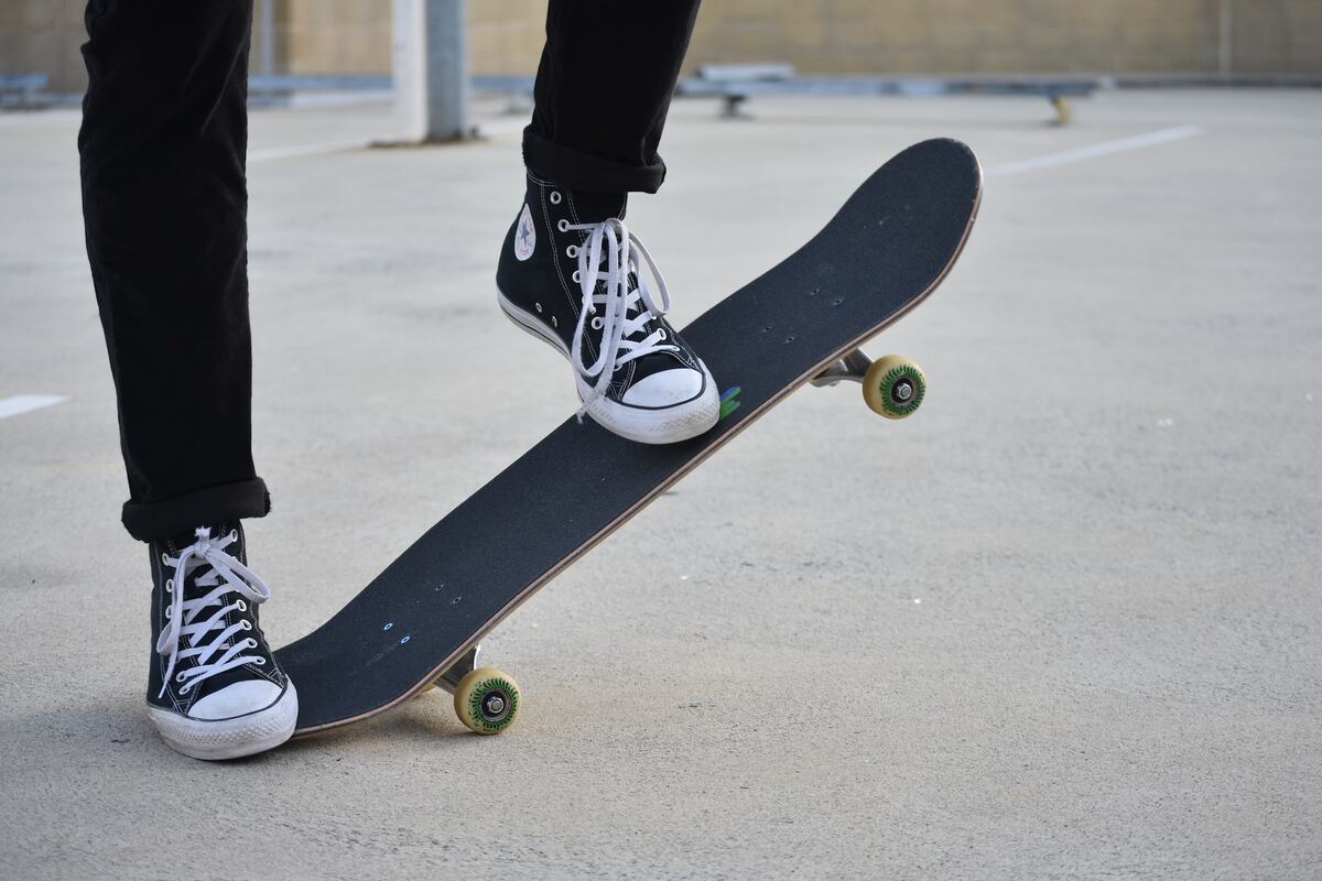Rollerblade Shop -Rollerblade Shop image of a skater with black hi top converse doing tricks on a skateboard unsplash